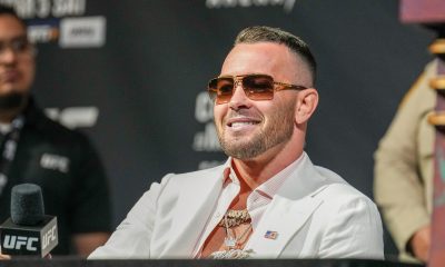 Colby Covington sorrindo durante coletiva de imprensa do UFC 272.