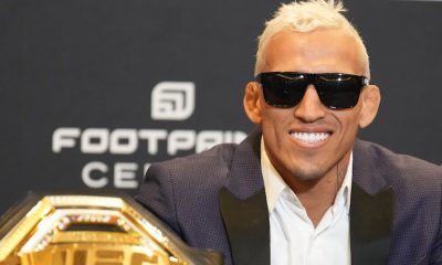 Sorridente e de óculos escuros, Charles Do Bronx atende a imprensa no UFC 274
