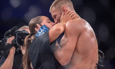 Luke Trainer e sua noiva se beijam no cage do Bellator 293