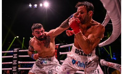 Mike Perry avança e lança jab de esquerda em Luke Rockhold durante combate no Bare Knuckle