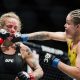 Tainara Lisboa acerta um soco durante sua luta de estreia no UFC, na qual venceu Jessica-Rose Clark por finalização.