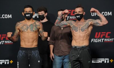Diego Ferreira e Gregor Gillespie posam para fotos de máscara após protagonizarem encarada no UFC.