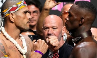 Alex Poatan e Israel Adesanya frente a frente durante encarada na pesagem cerimonial do UFC 287