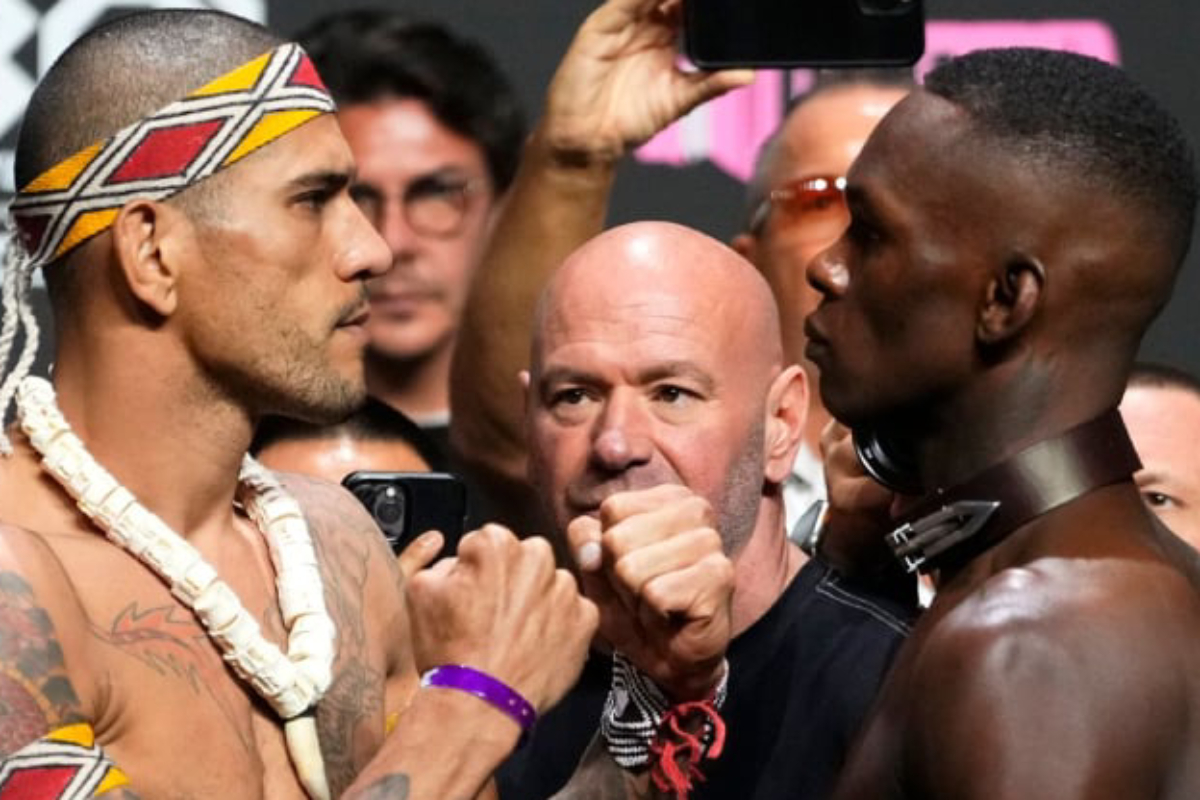 Alex Poatan e Israel Adesanya frente a frente durante encarada na pesagem cerimonial do UFC 287