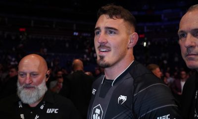 Tom Aspinall na entrada para a luta contra Marcin Tybura no UFC Londres.