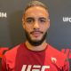 Gabriel Bonfim posa para foto durante o media day do UFC 291