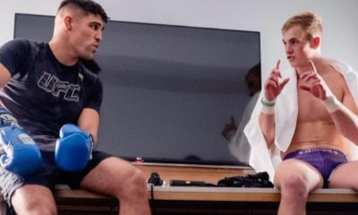 Vicente Luque e Ian Garry conversam após treino