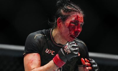 Irene Aldana com o rosto sangrando na luta contra Norma Dumont