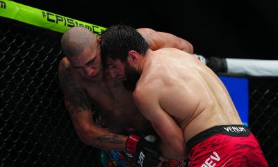 Magomed Ankalaev trava Alex Poatan na grade no UFC 313