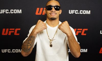 De óculos escuros e cordão, André Mascote posa para foto no media day do UFC Vegas 104