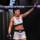 Denise Gomes acenando após vencer Elise Reed no UFC Vegas 106