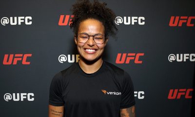 Aniversariante do dia, Karine Killer sorri para foto no media day do UFC 323