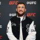 Merab Dvalishvili posa para foto no media day do UFC 323