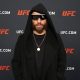 Jean Silva posando para foto após vitória no UFC 324